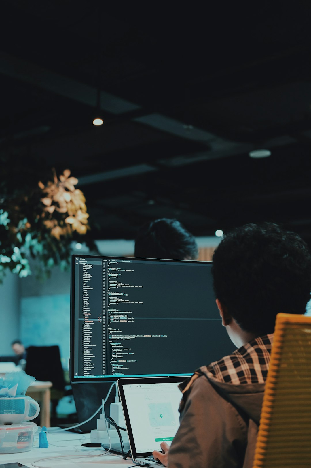 Developer coding in modern office environment